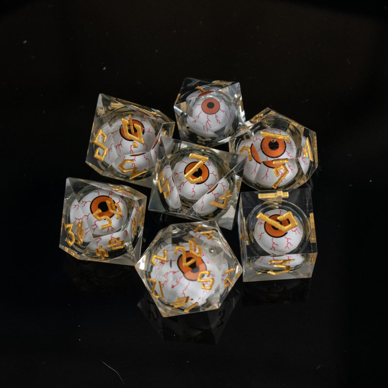 Load image into Gallery viewer, The Watcher: Orange-Eyed Liquid Core Dice Set
