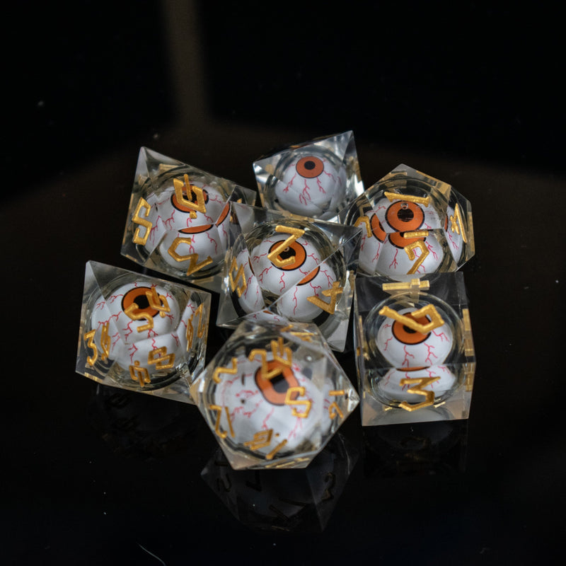 Load image into Gallery viewer, The Watcher: Orange-Eyed Liquid Core Dice Set
